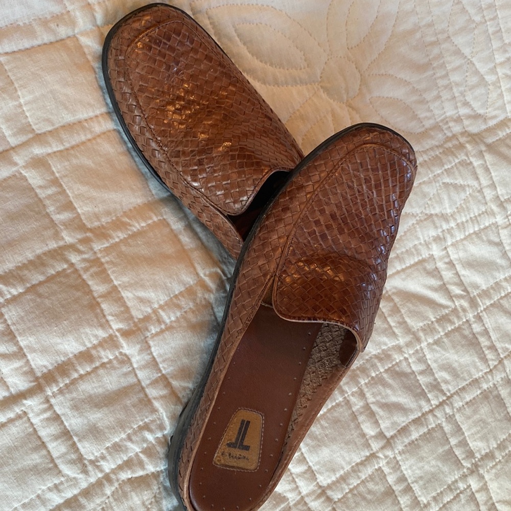 Classic comfort will be found in these woven leather Old Maine Trotter mules.